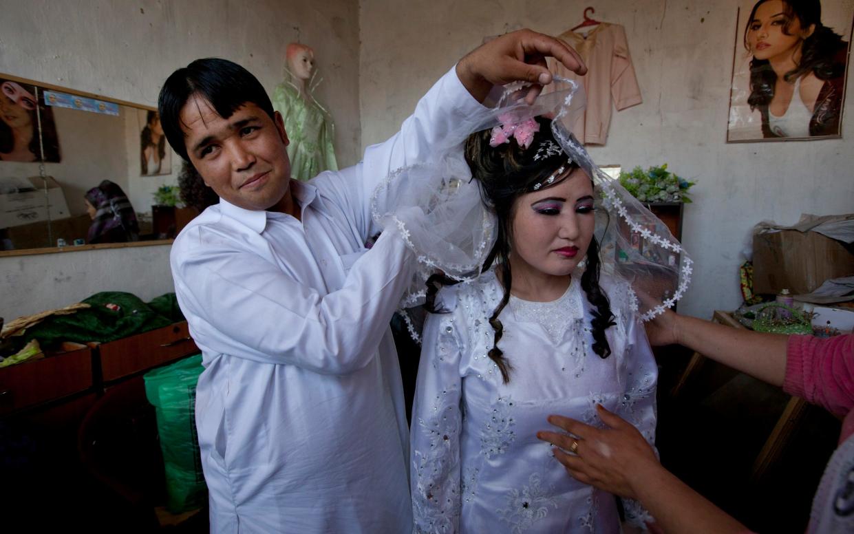 An Afghan bride at a local beauty parlor in Bamiyan in 2010 - Paula Bronstein /Getty Images 