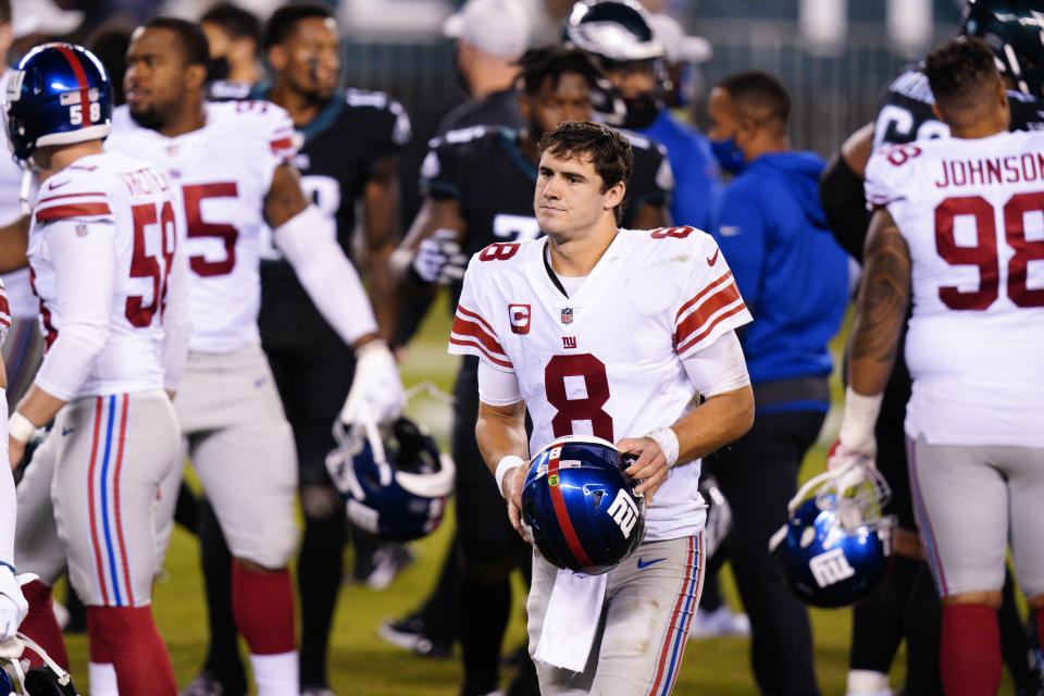 New York Giants' Daniel Jones walks off the field after an NFL football game Philadelphia Eagles, Thursday, Oct. 22, 2020, in Philadelphia. (AP Photo/Chris Szagola)