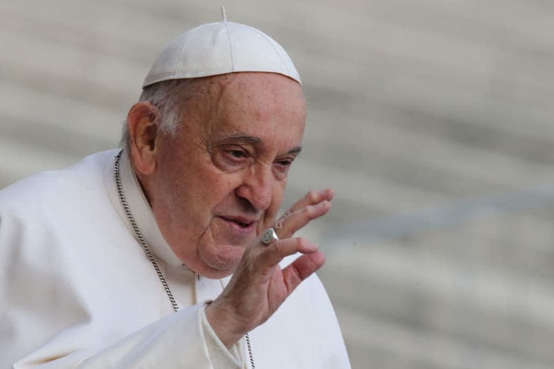 Pope Francis waves during his wednesday general audience in St. Peter's Square at the Vatican. Evandro Inetti/ZUMA Press Wire/dpa