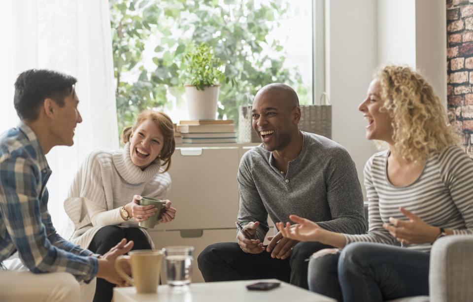 Healthy relationships help people feel wanted and contribute to human longevity. <a href="https://www.gettyimages.com/detail/photo/new-jersey-friends-hanging-out-in-living-room-royalty-free-image/545865797?phrase=happy+people+socializing&adppopup=true" rel="nofollow noopener" target="_blank" data-ylk="slk:Tetra Images via Getty Images;elm:context_link;itc:0;sec:content-canvas" class="link ">Tetra Images via Getty Images</a>