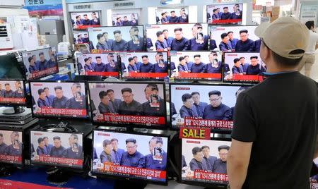A man watches TV news report about North Korea's nuclear test at an electronic shop in Seoul, South Korea on September 3, 2017. Han Jong-Chan/Yonhap/via REUTERS