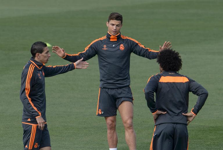 Real Madrid forward Cristiano Ronaldo (C) pictured during a training session at the Valdebebas training centre in Madrid on April 22, 2014, the eve of the club's UEFA Champions League semi-final first leg against Bayern Munich