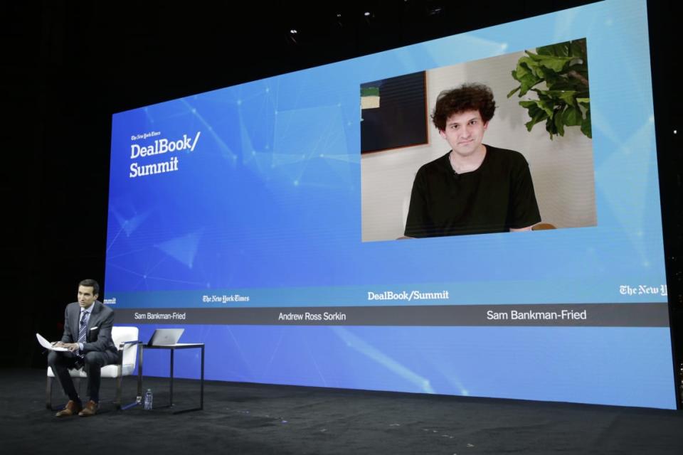 <div class="inline-image__caption"><p>Andrew Ross Sorkin and Sam Bankman-Fried on stage at the 2022 New York Times DealBook Summit on Nov. 30.</p></div> <div class="inline-image__credit">Thos Robinson/Getty</div>