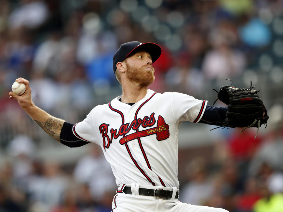 Atlanta Braves starting pitcher Mike Foltynewicz (26) works in the first inning of the second baseball game of a doubleheader against the Miami Marlins Monday, Aug. 13, 2018 in Atlanta. (AP Photo/John Bazemore)