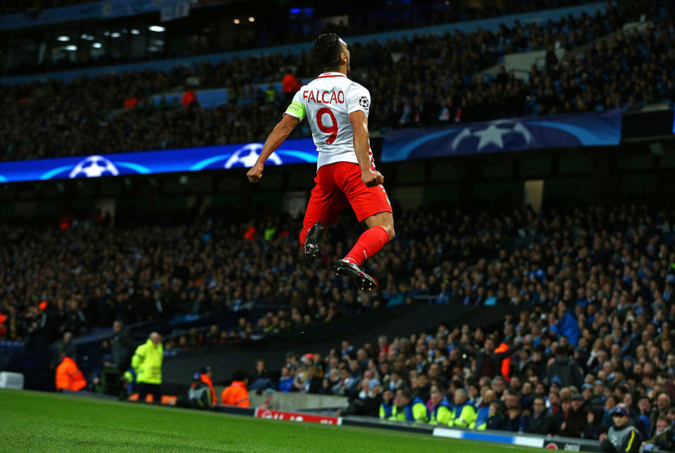 <p>Monaco’s Radamel Falcao celebrates after scoring his side’s first goal during the Champions League round of 16 first leg soccer match between Manchester City and Monaco at the Etihad Stadium in Manchester, England, Tuesday Feb. 21, 2017. (AP Photo/Dave Thompson) </p>