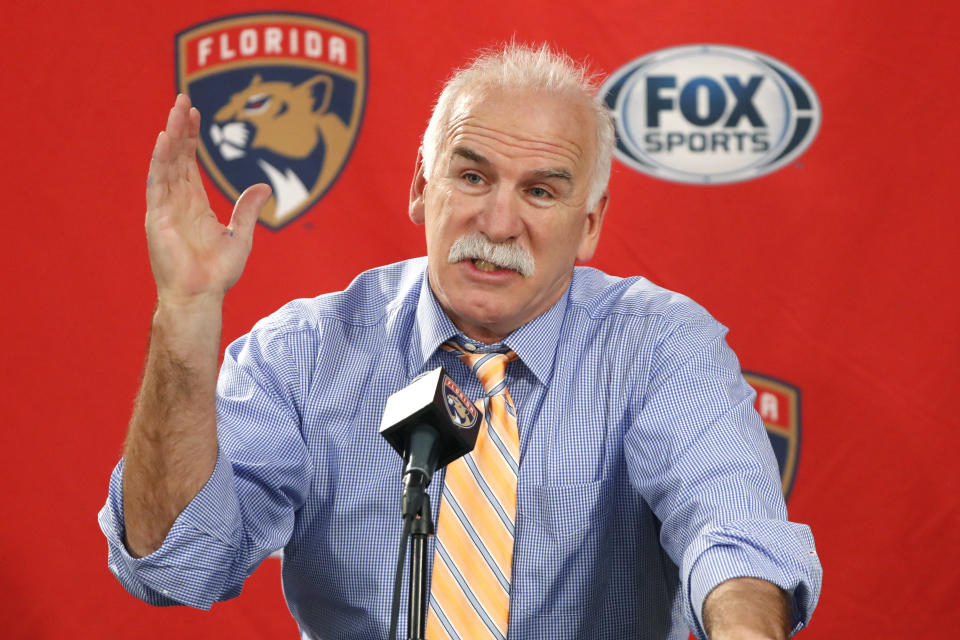 Florida Panthers head coach and former Chicago Blackhawks coach, Joel Quenneville, responds to a question during his first visit back to Chicago as a head coach before an NHL hockey game between the Blackhawks and Panthers Tuesday, Jan. 21, 2020, in Chicago. (AP Photo/Charles Rex Arbogast)