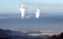 <p>Smoke rises from chimneys of the coal-fired power plant in Bogatynia, Poland. The picture was taken from a hill near the town of Frydlant, Czech Republic, Tuesday, Feb. 14, 2017, as smog across coal-addicted Poland hit crisis levels recently. (AP Photo/Petr David Josek) </p>