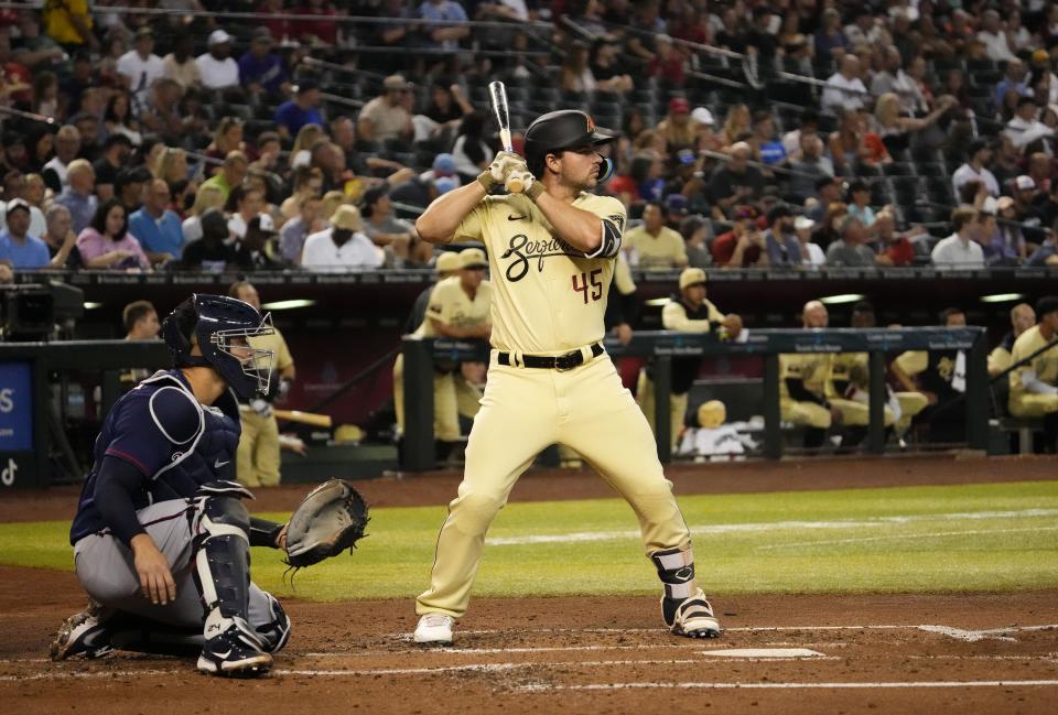 Jun 17, 2022; Phoenix, Arizona, USA; Arizona Diamondbacks designated hitter Buddy Kennedy (45) bats against the Minnesota Twins in the second inning at Chase Field.