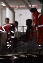 Migrants rescued off the Libyan coast arrive at the harbor in Catania, Italy, on April 20, 2015