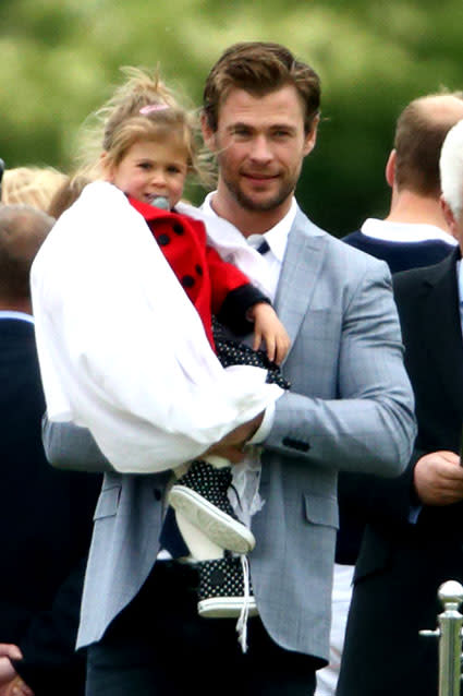 You know you've arrived when Thor carries you to meet Prince Harry. That's the life of Chris Hemsworth's 3-year-old daughter, India, who met the royal bachelor on Sunday along with her famous dad and mother, Elsa Pataky. Prince Harry was introduced to the incredibly good looking family during day two of the Audi Polo Challenge at Coworth Park in London, England. His brother and new dad, Prince William, was also in attendance. <strong> PHOTOS: Stars Share Pics of Their Adorable Tots </strong> One thing is for certain, India is definitely a daddy's girl. The tiny tot couldn't have looked more adorable if she tried as she was escorted by her dapper dad, who just so happens to be   <em>People</em> magazine's Sexiest Man Alive. Getty Images Even Pataky was overwhelmed by all the cuteness and Instagrammed a pic of the father-daughter moment. "We all enjoy the polo match! So much fun!" she wrote with the hashtags "#myfavoritecouple #lovepapa #londongreen." <strong> WATCH: Prince Harry Has an Adorable 'Cinderella' Moment With Little Girl </strong> Prior to meeting the Hemsworths, Prince Harry did express an interest in starting a family of his own. We like to think him meeting little India in the arms of her doting dad may have given the 30-year-old prince another push in that direction.