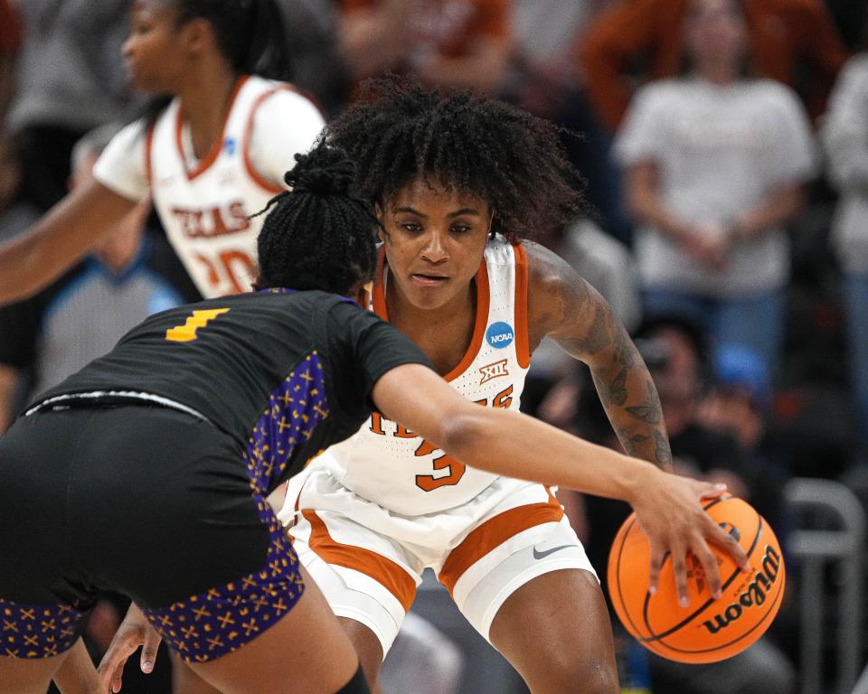 Texas Longhorns guard, Rori Harmon (3) guards East Carolina guard, Micah Dennis (1) during the women’s NCAA playoff game at the Moody Center on Saturday Mar. 18, 2023 in Austin.