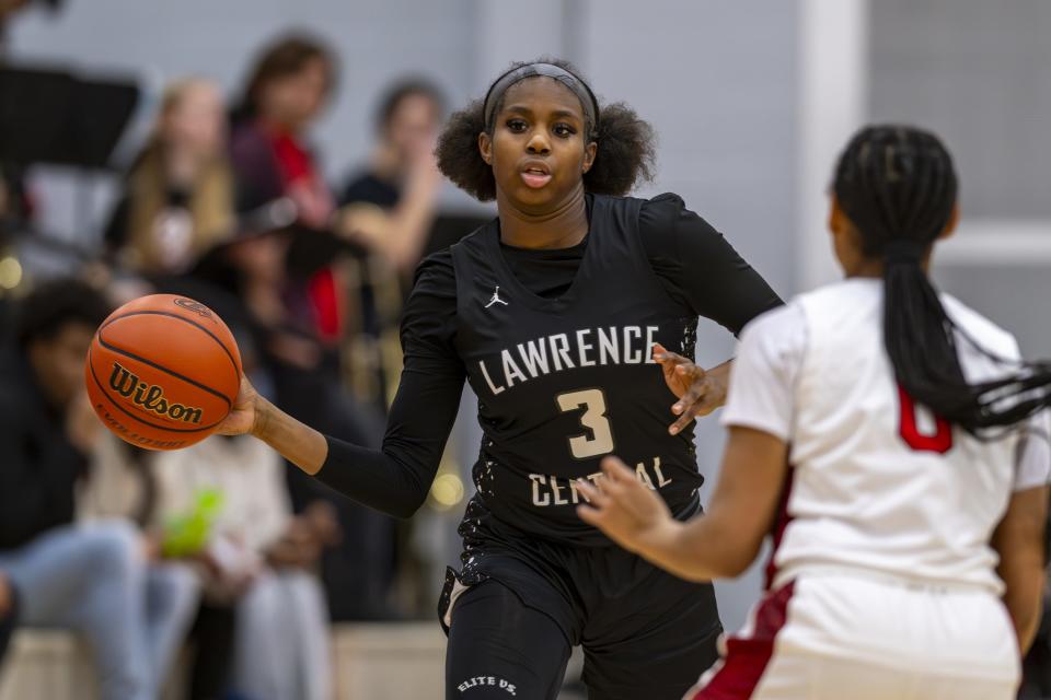 Lawrence Central High School sophomore Lola Lampley (3) looks up court for a teammate to pass off to during the first half of an IHSAA basketball game against Pike High School, Friday, Dec. 15, 2023, at Pike High School.