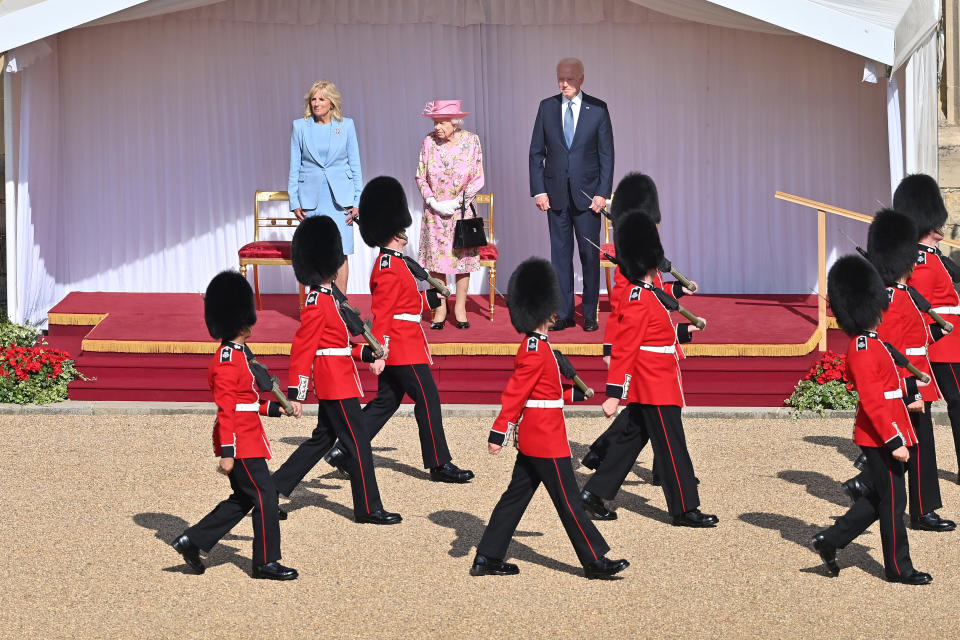 WINDSOR, ENGLAND - JUNE 13: Queen Elizabeth II (C), US President Joe Biden (R) and US First Lady Dr Jill Biden (L) at Windsor Castle on June 13, 2021 in Windsor, England.  Queen Elizabeth II hosts US President, Joe Biden and First Lady Dr Jill Biden at Windsor Castle. The President arrived from Cornwall where he attended the G7 Leader's Summit and will travel on to Brussels for a meeting of NATO Allies and later in the week he will meet President of Russia, Vladimir Putin. (Photo by Samir Hussein - Pool/WireImage)