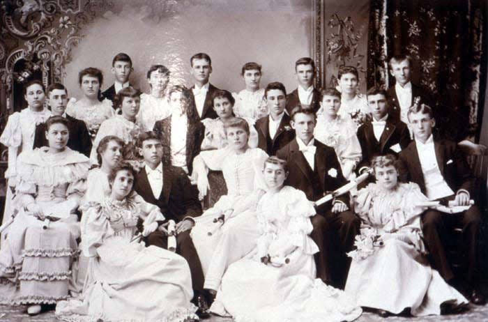 Photo shows members of the Monroe High School Class of 1893, including Ella O. Foster (far left, second row). Monroe High School students attended classes in the Macomb School building at this time (1888-1912). (Courtesy MCCC Digital Collections)