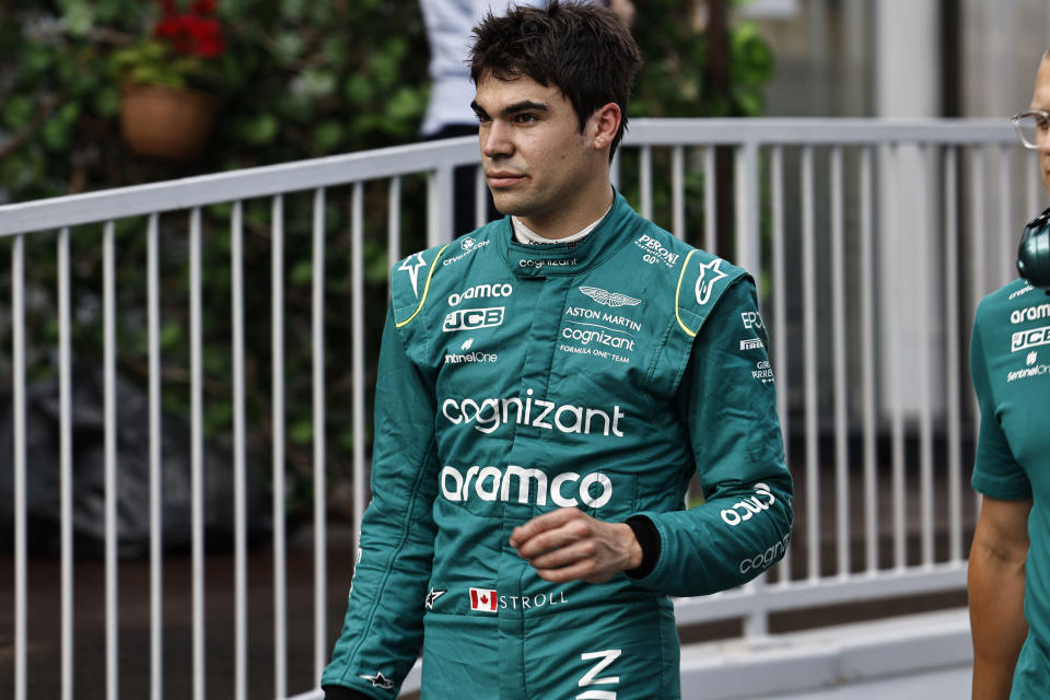 Aston Martin driver Lance Stroll of Canada backs to the pits during the qualifying session at the Baku circuit, in Baku, Azerbaijan, Saturday, June 11, 2022. The Formula One Grand Prix will be held on Sunday. (Hamad Mohammed, Pool Via AP)