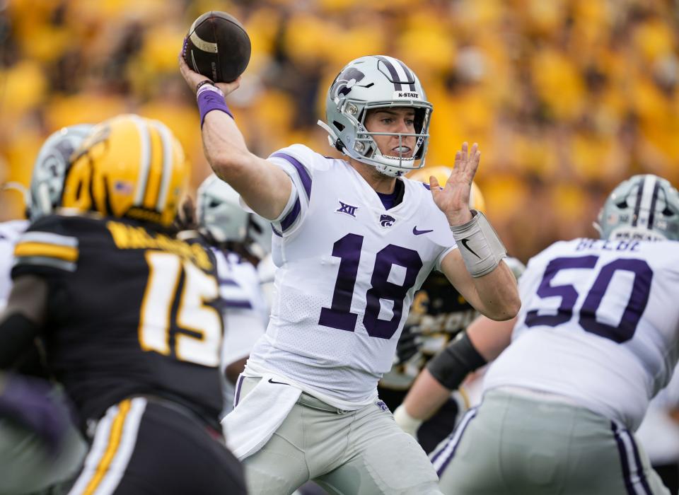 Sep 16, 2023; Columbia, Missouri, USA; Kansas State Wildcats quarterback Will Howard (18) throws a pass against the Missouri Tigers during the first half at Faurot Field at Memorial Stadium. Mandatory Credit: Jay Biggerstaff-USA TODAY Sports