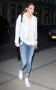 <p>Hadid brought denim and leather into spring, pairing a custom Neuw leather jacket with lighter hues and bright white kicks. </p>