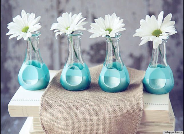 Add some color to your space with these <a href="http://www.huffingtonpost.com/2013/01/23/make-paint-dipped-bud-vas_n_2530606.html?utm_hp_ref=crafts" target="_hplink">paint dipped vases</a>.