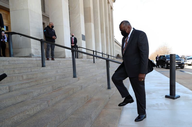 FILE PHOTO: Newly confirmed U.S. Defense Secretary Lloyd Austin arrives at the Pentagon in Arlington, Virginia