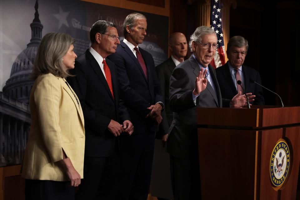 WASHINGTON, DC - JULY 12: U.S. Senate Minority Leader Sen. Mitch McConnell (R-KY) speaks as (L-R) Sen. Joni Ernst (R-IA), Sen. John Barrasso (R-WY), Senate Minority Whip Sen. John Thune (R-SD), Sen. Rick Scott (R-FL), and Sen. Roy Blunt (R-MO) listen during a news briefing after a weekly Senate Republican policy luncheon at the U.S. Capitol on July 12, 2022 in Washington, DC.