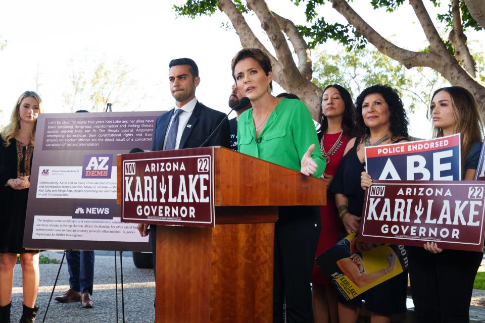 Kari Lake speaks at a news conference outside her office on Oct. 27, 2022, in Phoenix.