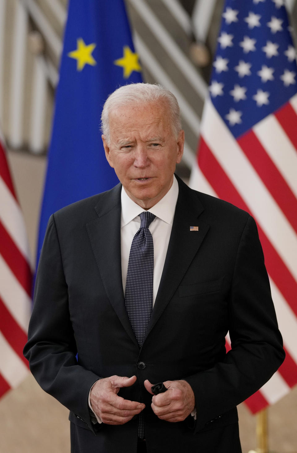 U.S. President Joe Biden speaks with the media as he arrives for the EU-US summit at the European Council building in Brussels, Tuesday, June 15, 2021. (AP Photo/Francisco Seco)