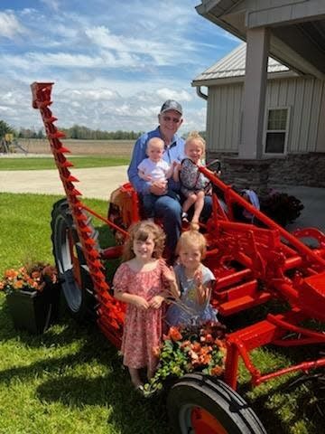 Richard Smith celebrated his 80th birthday with great-granddaughters Clara, Kimber and Kendall and great-grandson Micah.