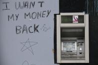 A cash machine is seen during a demonstration to protest the government's proposed labour law reforms in Nantes, France, May 26, 2016. REUTERS/Stephane Mahe