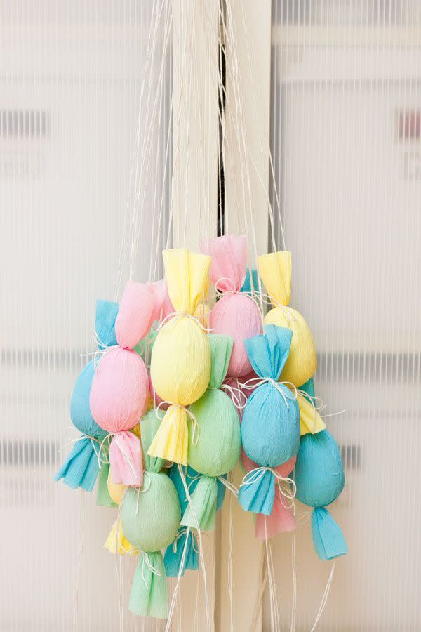 easter egg poppers hanging from strings