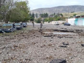 A view shows cars damaged during fighting over the breakaway region of Nagorno-Karabakh