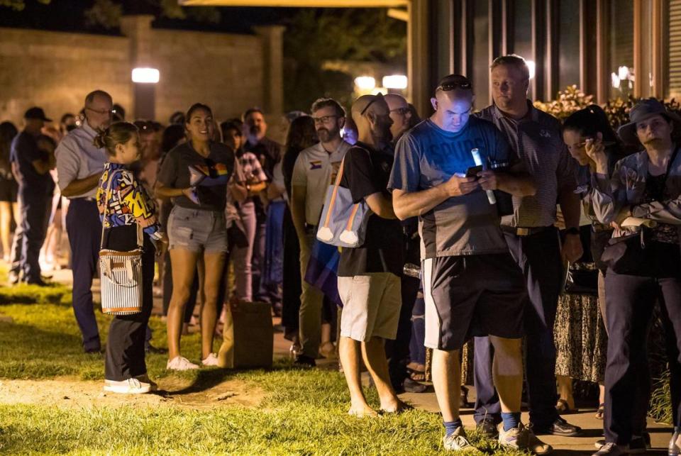 A line wraps around the building as Rocklin teachers, community members, parents and students wait for hours to comment during the Rocklin Unified School District Board meeting Wednesday where a policy requiring schools to possibly violate state law by “outing” transgender students to their parents was on the agenda. The board passed the policy that would require staff to notify families within days of a student’s choosing to be identified as any name, nickname, or gender that does not match enrollment records or is not a “common” nickname recognized by the school.