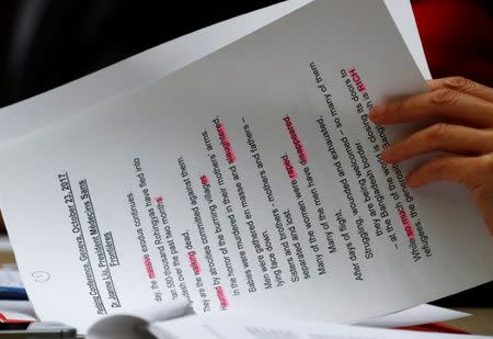 Words like haunted, slaughtered, raped, disappeared are highlighted on the speech of Joanne Liu, president of Medecins Sans Frontieres (MSF), during the Pledging Conference for Rohingya Refugee Crisis in Bangladesh at the United Nations in Geneva, Switzerland October 23, 2017. REUTERS/Denis Balibouse