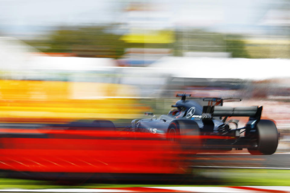 All a blur: The Mercedes of Lewis Hamilton leads Max Verstappen’s Red Bull at the 2017 Japanese Grand Prix