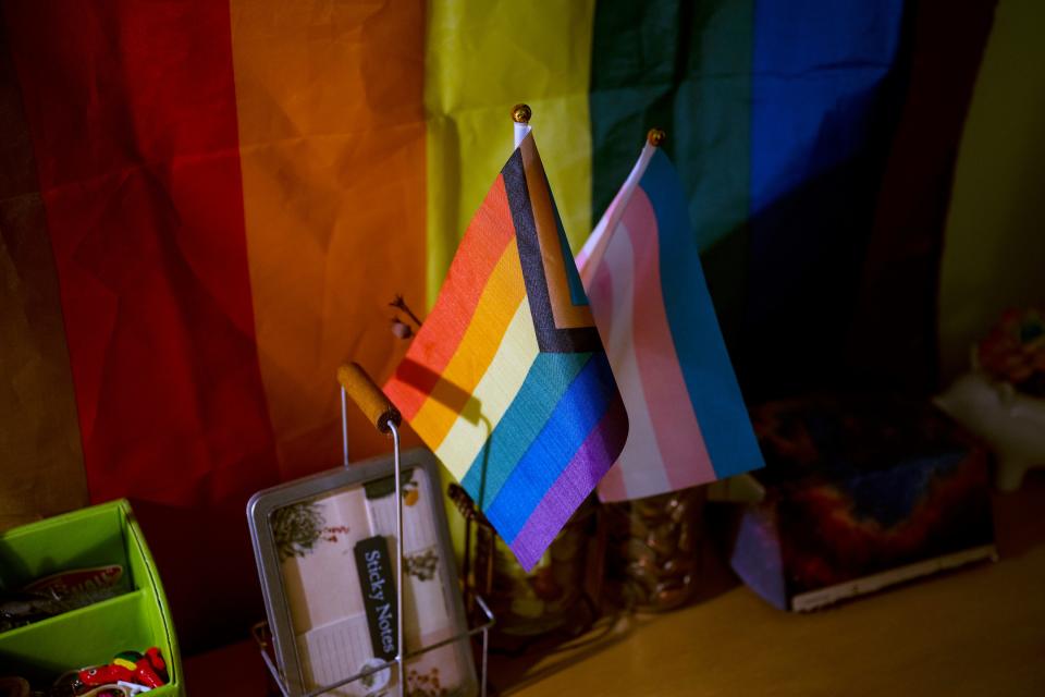 Pride flags are displayed in the bedroom of high school student Leo Burchell in Pennsylvania on Wednesday, Nov. 16, 2022. As politicians and activists push for limits on discussions of race, gender and sexuality, some students say the measures targeting aspects of their identity have made them less welcome in American schools — the one place where all kids are supposed to feel safe. (AP Photo/Joe Lamberti)