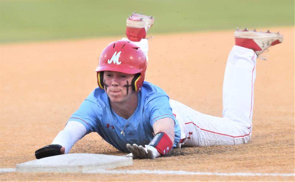 Lubbock Monterey's Will Collier slide safely into third on Nick Zarate's two-out single in the fourth inning. The Plainsmen left the bases loaded in the inning against Abilene High.