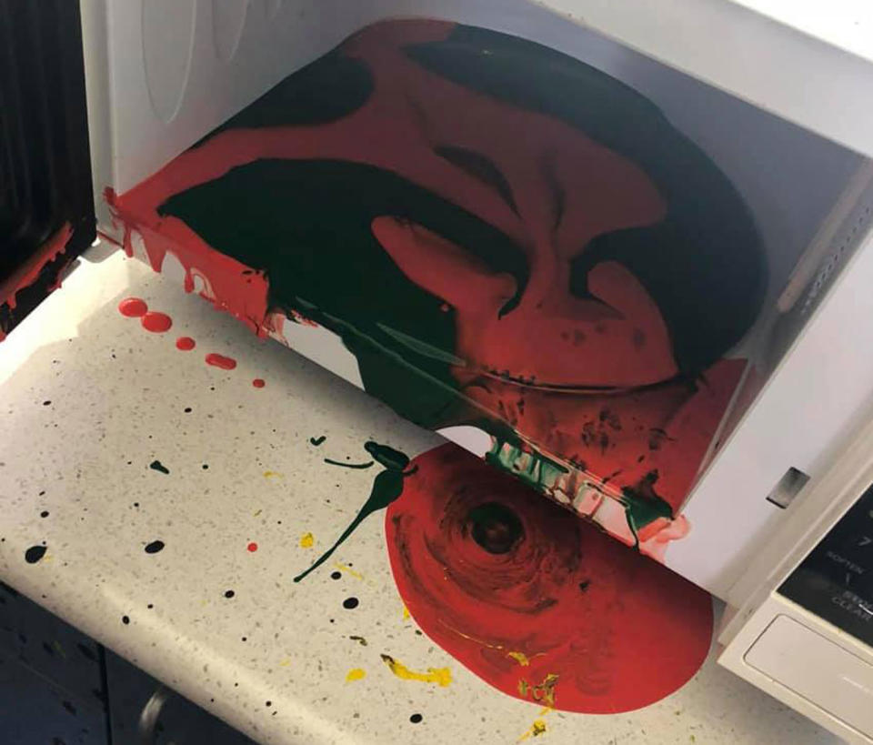 A microwave with what appears to be paint inside. Source: Facebook/ Meridan State College