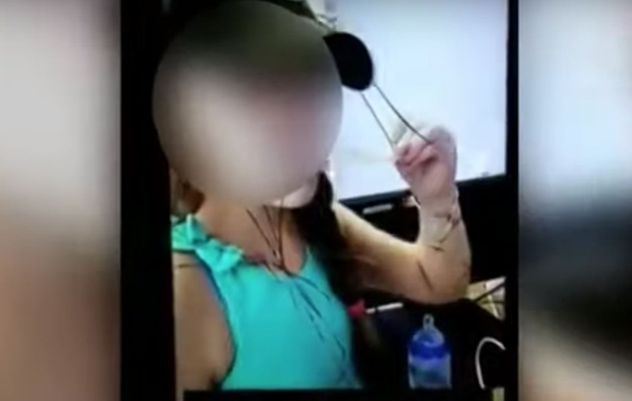 A mother was arrested after she shared a video on social media of her daughter licking, and then returning, a tongue depressor in a Florida doctor's office. (Photo: YouTube)