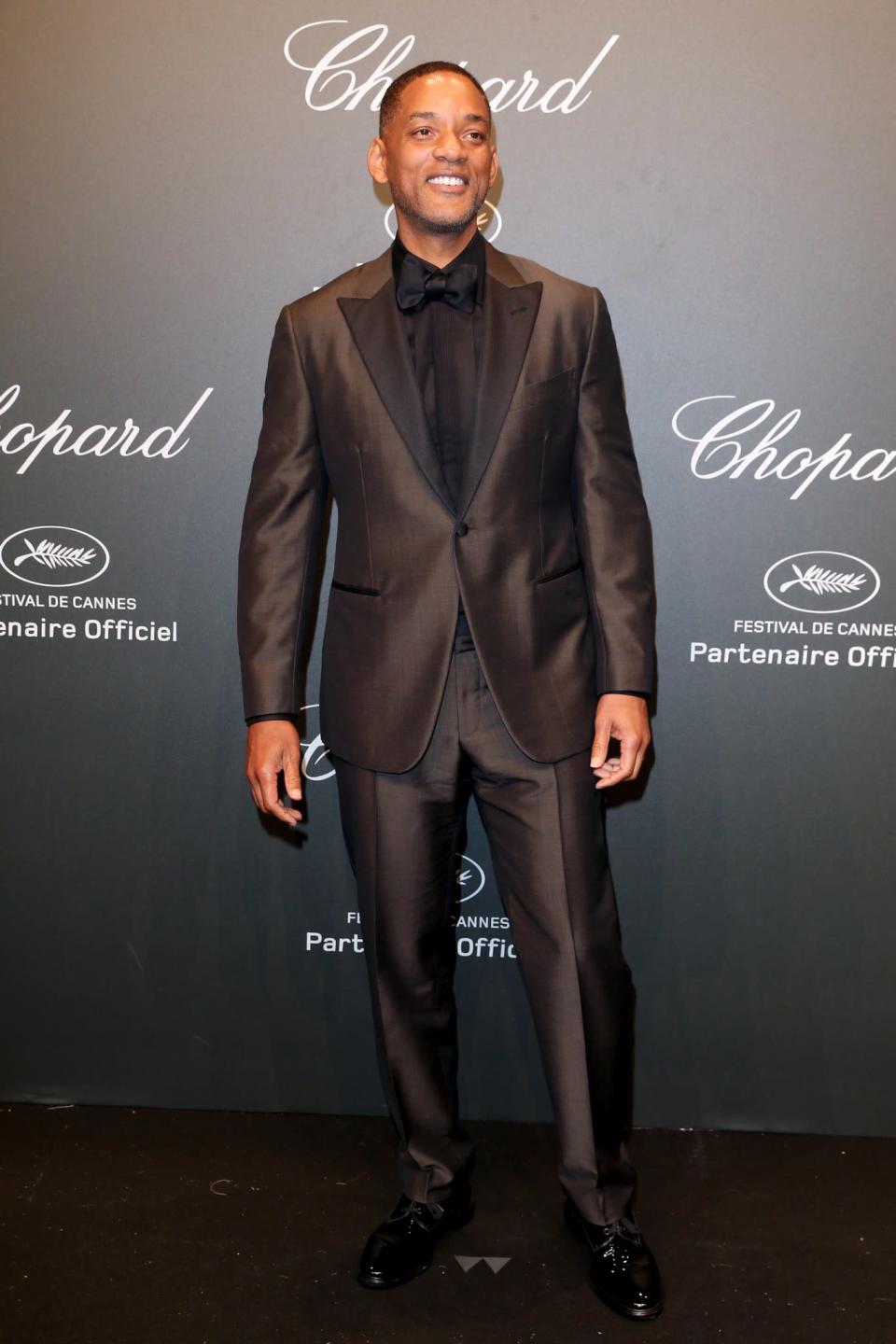 <p>Will went for something a little different in the form of a chocolate brown suit.<br><i>[Photo: Getty]</i> </p>