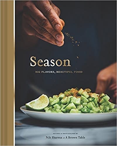 FYI, the secret to better dinners—and dinner parties—is hiding inside this cookbook. <a rel="nofollow noopener" href="https://www.amazon.com/Season-Big-Flavors-Beautiful-Food/dp/1452163995/" target="_blank" data-ylk="slk:SHOP NOW;elm:context_link;itc:0;sec:content-canvas" class="link ">SHOP NOW</a>: <em>Season: Big Flavors, Beautiful Food</em> by Nik Sharma, $23