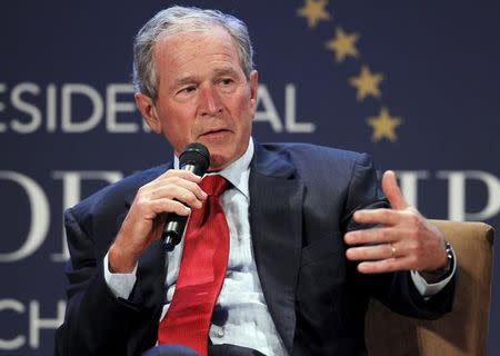 Former U.S. President George W. Bush speaks during a moderated conversation at the graduation of the inaugural class of the Presidential Leadership Scholars program, a partnership between the presidential centers of George W. Bush, William J. Clinton, George H.W. Bush, and Lyndon B. Johnson at the George W. Bush Presidential Library in Dallas, Texas July 9, 2015. REUTERS/Mike Stone/Files