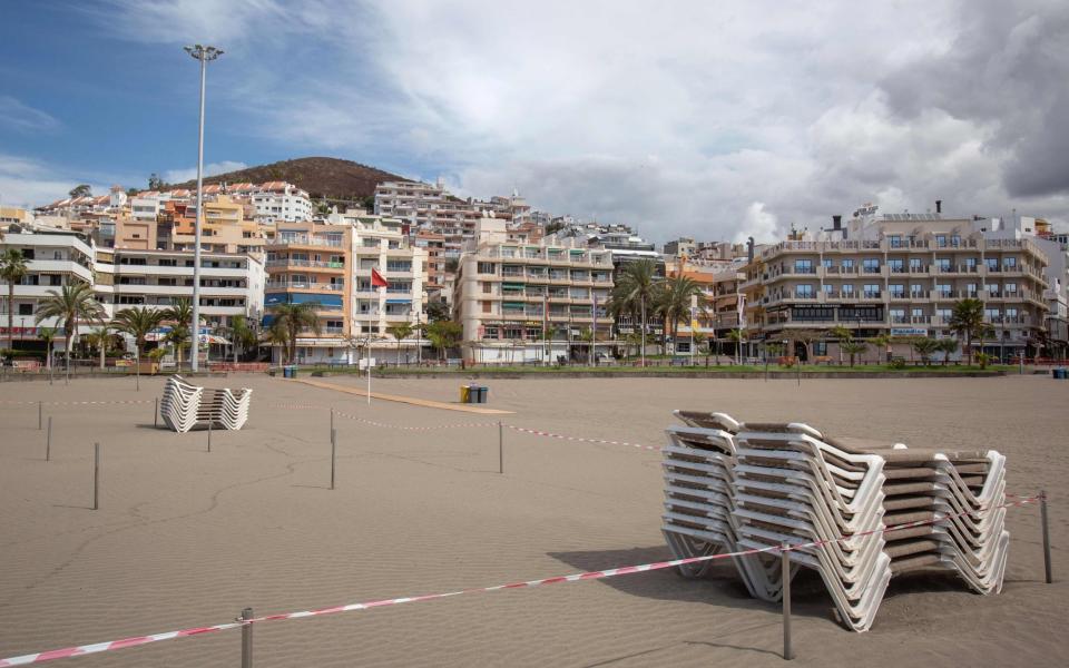 A closed beach remains empty in Arona, one of the most touristic municipalities in Tenerife on the Canary Islands, on April 13, 2020 amid a national lockdown