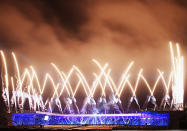 Fireworks explode over Celtic Park at the end of the ceremony.