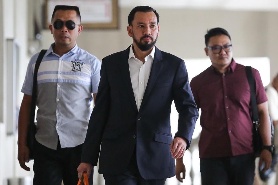 Datuk Amhari Efendi Nazaruddin leaves the courtroom during a break in the 1MDB trial at the Kuala Lumpur Courts Complex September 18, 2019. — Picture by Yusof Mat Isa