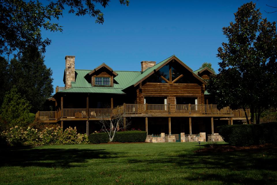 A log home serves as the main residence at the Big Tree Farm estate in Santa Claus, Ind., Thursday afternoon, Sept. 22, 2022.