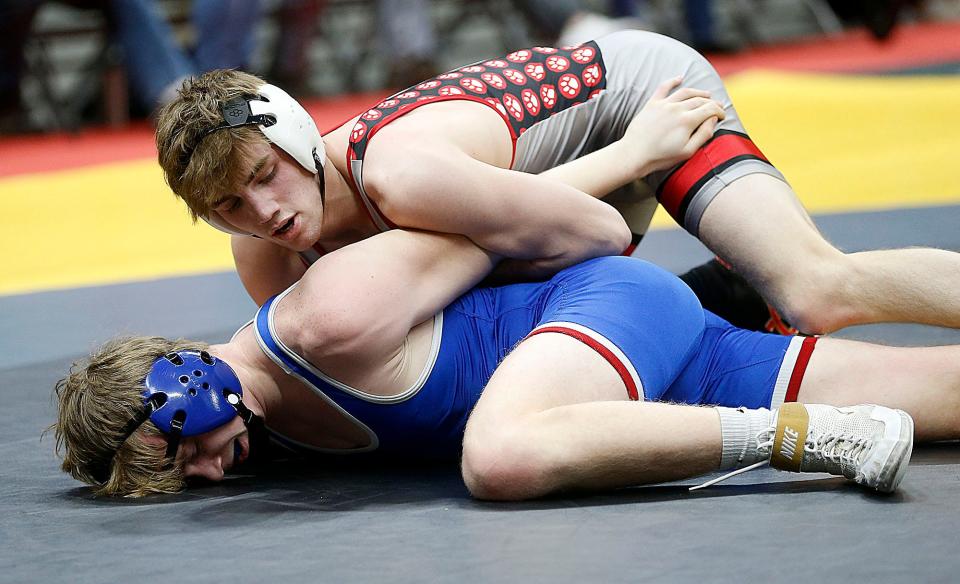 Crestview's Hayden Kuhn wrestles Tuslaw's Maxwell Cooper during their 144 lbs. match at the OHSAA State Wrestling Championships Sunday, March 12, 2023 at the Jerome Schottenstein Center. . TOM E. PUSKAR/ASHLAND TIMES-GAZETTE