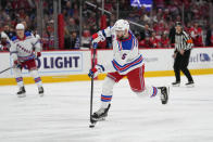 New York Rangers defenseman Ben Harpur shoots against the Washington Capitals during the second period of an NHL hockey game, Saturday, Feb. 25, 2023, in Washington. (AP Photo/Julio Cortez)