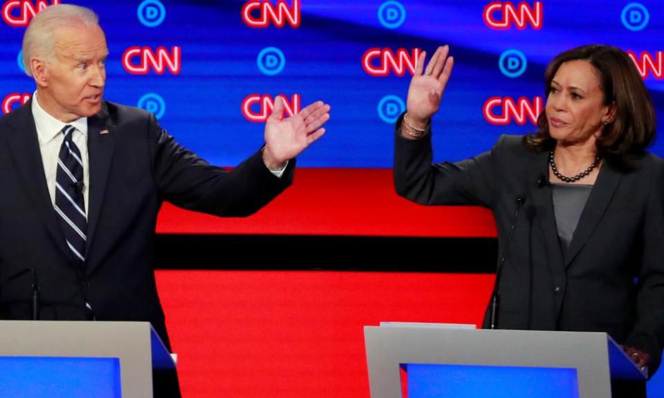 Joe Biden and Kamala Harris gesture on the second night of the second Democratic debate in Detroit, in July.