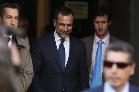 U.S. ambassador in Spain, James Costos (C), leaves the foreign ministry after being summoned to a meeting with Spain's European Secretary of State in Madrid October 28, 2013. REUTERS/Juan Medina