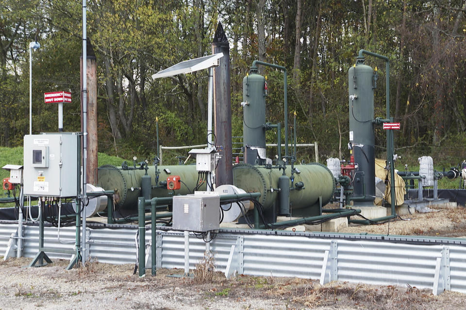 An XTO Energy natural gas fracking well pad is seen in Freeport, Pennsylvania, on Thursday, Oct. 15, 2020. President Trump accuses Joe Biden of wanting to ban fracking, a sensitive topic in the No. 2 natural gas state behind Texas. Biden insists he does not want to ban fracking broadly - he wants to ban it on federal lands and make electricity production fossil-fuel free by 2035. (AP Photo/Ted Shaffrey)