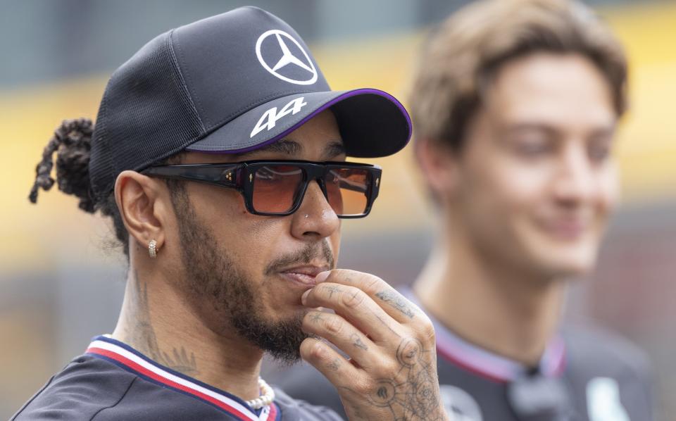 Lewis Hamilton of Great Britain and Mercedes reacts from the drivers parade prior to the F1 Grand Prix of China at Shanghai International Circuit on April 21, 2024 in Shanghai, China